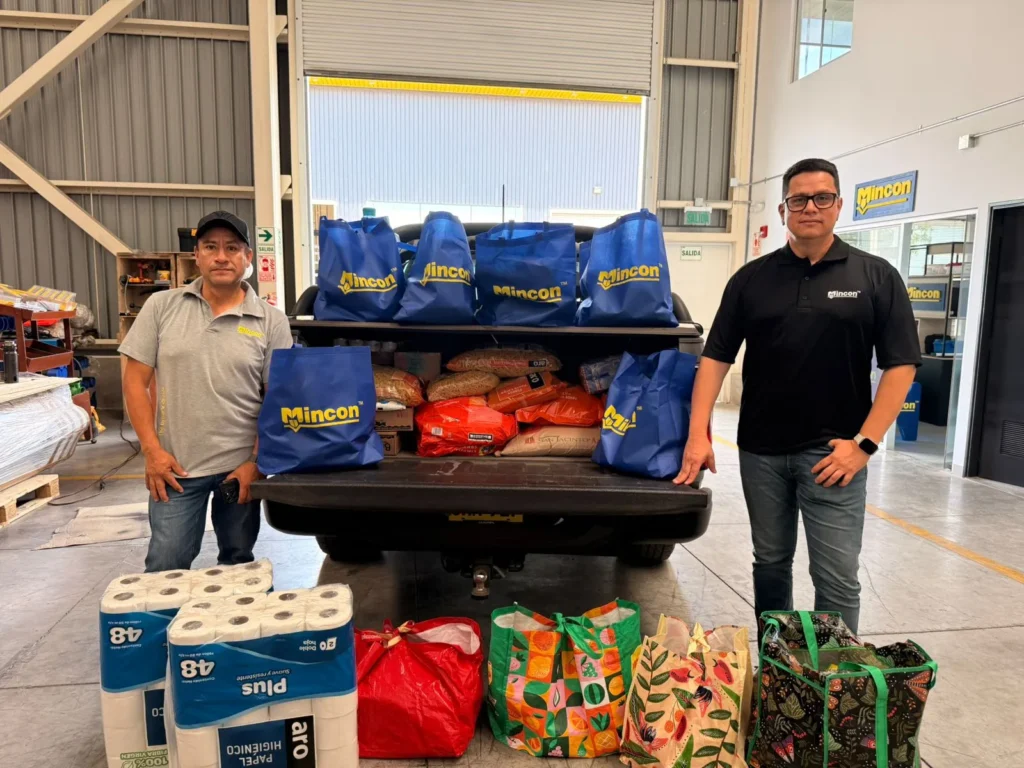 Mincon Peru team members preparing essential supplies and food for delivery to families affected by the Lima fire