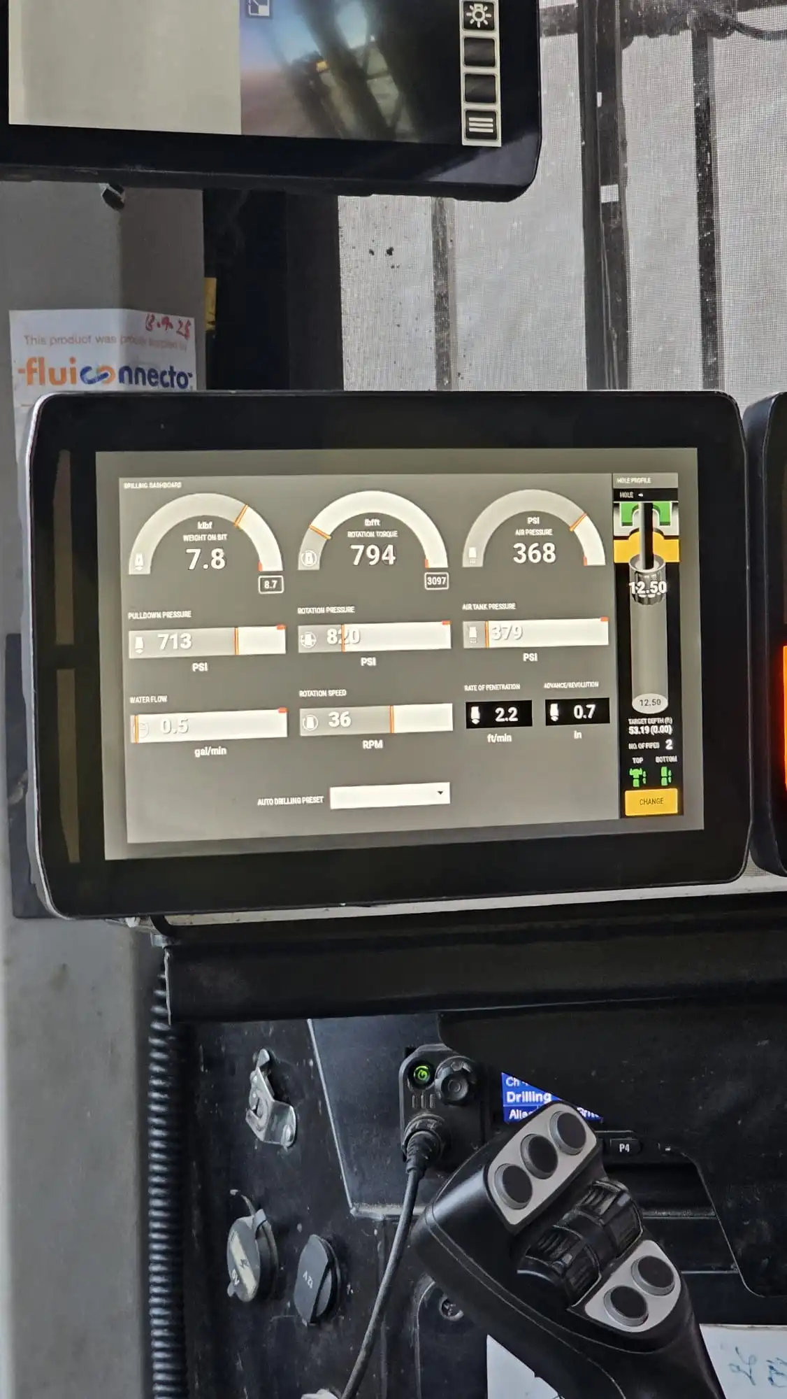 Close-up of a Mincon DTH hammer showing balanced feed pressure and rotation during blast-hole drilling
